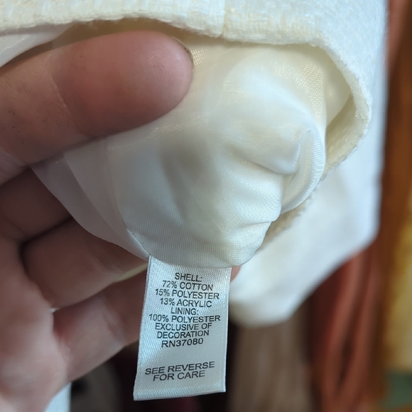 Chic White Jacket with Black Bow Accents - Picture 8 of 11